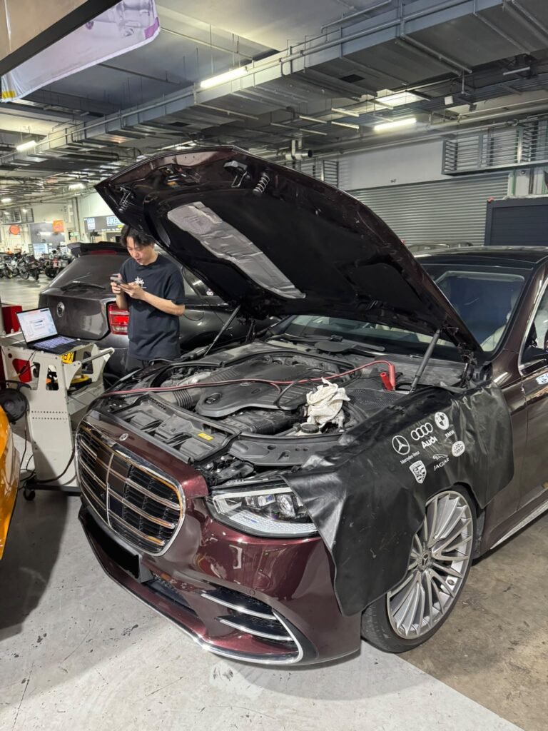 Car coding Singapore: technician programming a Mercedes-Benz S400 headlamp at TEC AUTO, Carros Centre