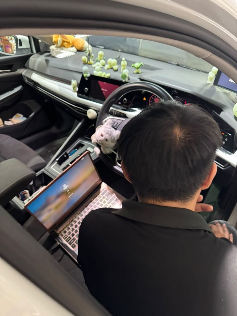 VW Golf Mk8 battery registration with a diagnostic laptop after car battery replacement, TEC AUTO Singapore