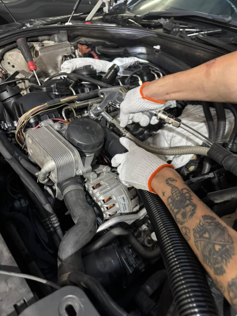 Walnut blasting carbon cleaning in progress on a BMW N55 engine with the intake manifold removed, TEC AUTO Singapore